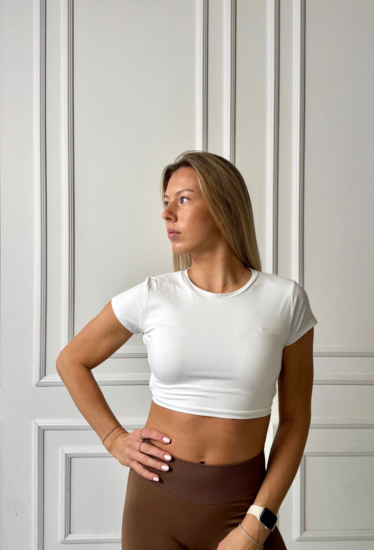 Balta sportinė palaidinė atvira nugara